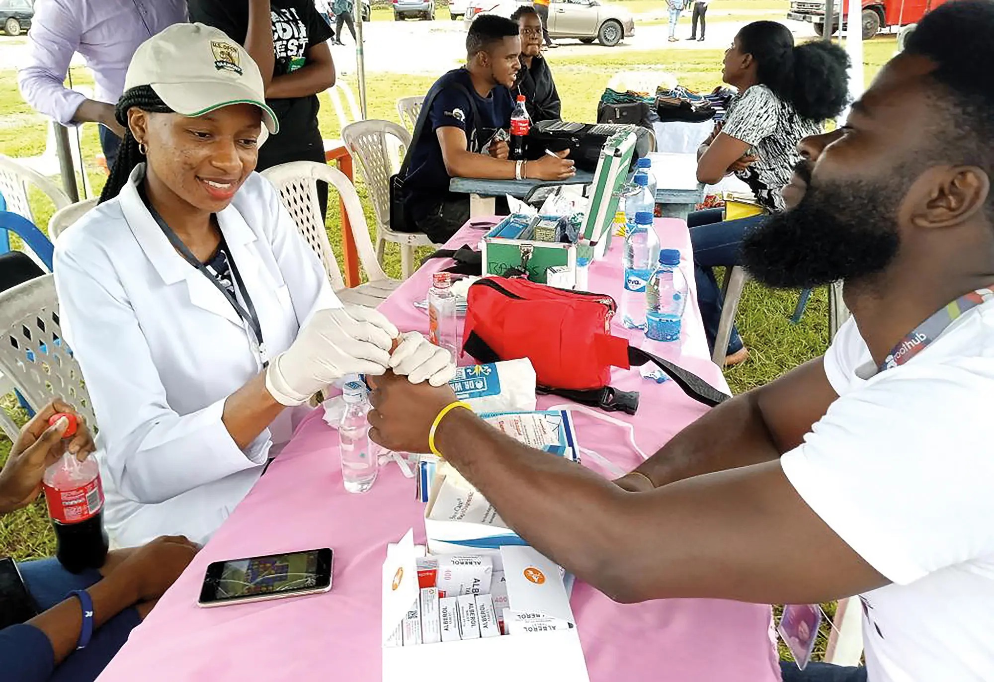 A medical professional tests someone for viral hepatitis